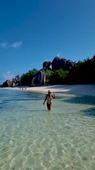 Anse Source d'Argent La Digue Seychelles Young Woman on a Tropical Beach During a Luxury Vacation in alt