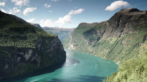 Fjord Geirangerfjord With Ferry Boat, Norway. Timelapse alt