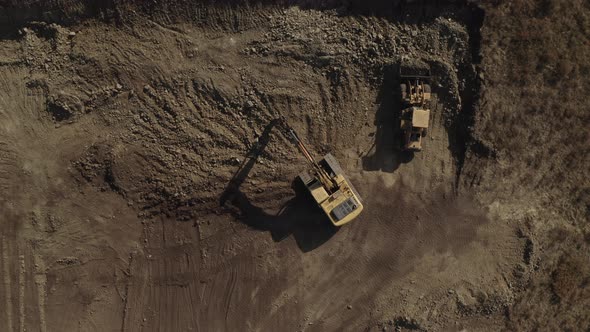 Aerial View of Excavators Doing Earth Work at Construction Site