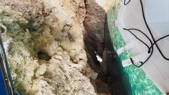 Vertical Footage From Boat in Motion the Boat Enters the Cave the Picturesque Bay of Dalyan in