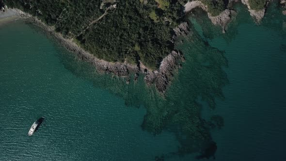 Amazing view on  azure Adriatic sea and rocky shore with plants. Aerial view of Montenegro alt
