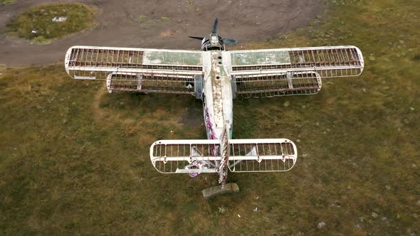 Old abandoned airplane in the field