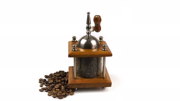 Rotating Retro Coffee Grinder With Coffee Beans.4