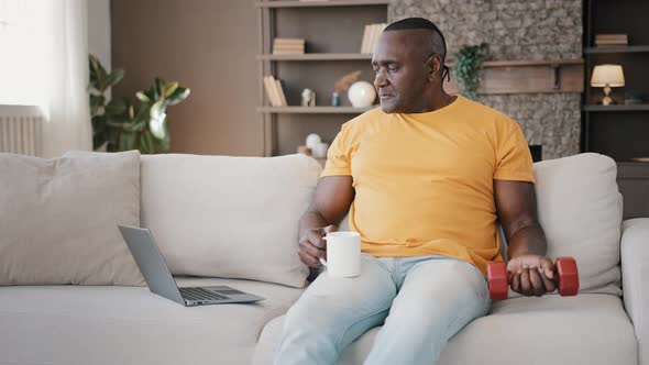 Masculine African American Retired Sportsman Doing Biceps Curls Pumping Muscles with Dumbbells alt