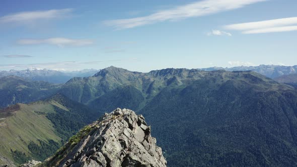 Aerial view, drone moving over a mountain range alt