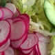 Salad ingredients in a glass bowl, cabbage, radish, onion, cucumber, egg. - VideoHive Item for Sale