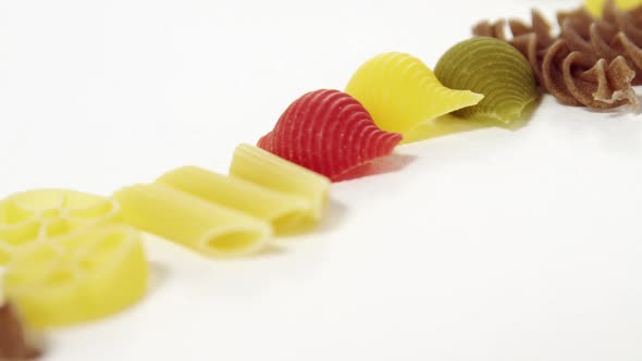 Various pasta on white background alt