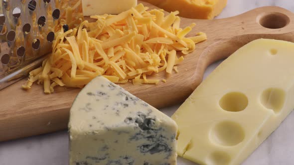 Variety of Cheeses; Cheddar, Blue Cheese, Swiss, Pepper Jack.