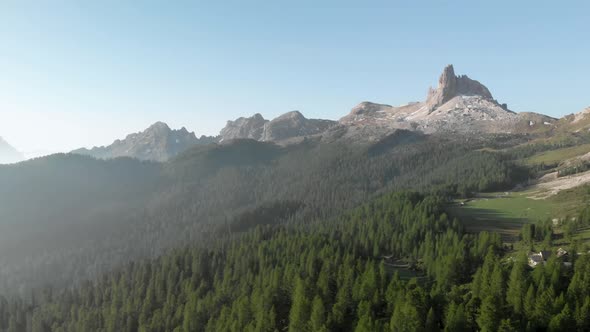 Aerial Flying over Mountain Forest at Croda da Lago in Dolomites Alps Italy alt