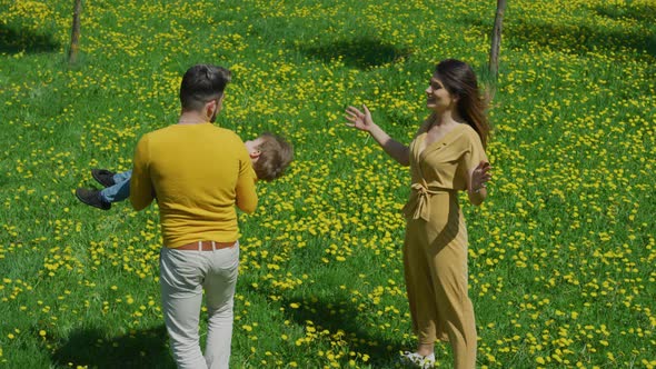 Father playing with his son alt