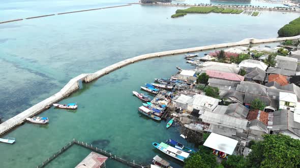 Cinematic overhead aerial view of Harapan island in seribu islands, Indonesia.