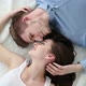 Young Loving Couple Lying on Bed at Home - VideoHive Item for Sale
