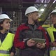 Male Technician Giving Two Female Inspectors Tour of Factory - VideoHive Item for Sale