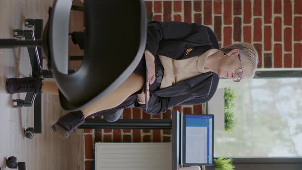 Vertical Video Psychologist Sitting in Circle with Chairs and Waiting on People at Aa Group Meeting alt