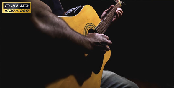 Man Playing A Solo With Guitar