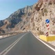 Car driving at sunny countryside route. POV car riding through mountains - VideoHive Item for Sale