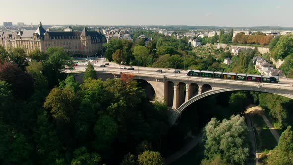 Establishing Aerial Shot of Luxembourg Cityscape with Landmark Adolphe Bridge