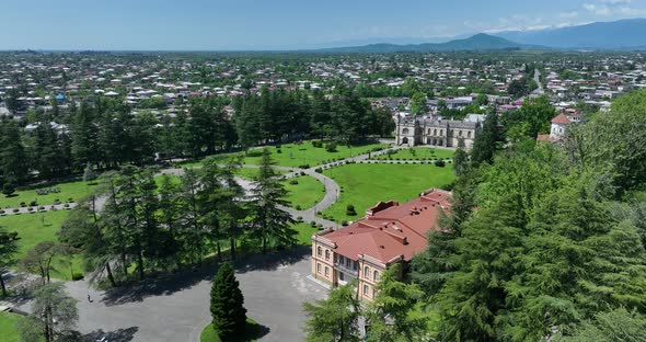Zugdidi, Georgia - May 30 2022: Aerial view of Dadiani Palace in the center of Zugdidi city alt