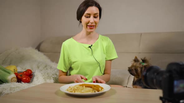 Young Female Blogger Live Streaming Refusal of Fast Food in Favor of Healthy Diet alt