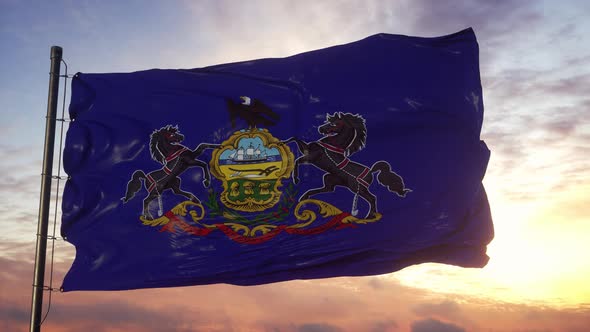 Flag of Pennsylvania Waving in the Wind Against Deep Beautiful Sky at Sunset alt