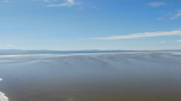 Stunning View of Great Salt Lake and Blue Sky Reflecting in the Water USA alt