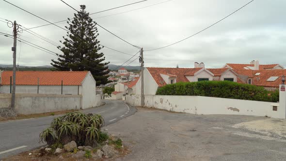 Red Tile Roof Houses in Azenhas do Mar on a Cloudy Day
