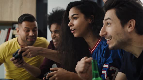 Tracking video of excited friends  during playing a game console. Shot with RED helium camera in 8K alt