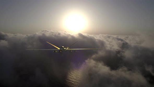 A military drone with full armament flies in the clouds. Sunrise the beginning of a military mission