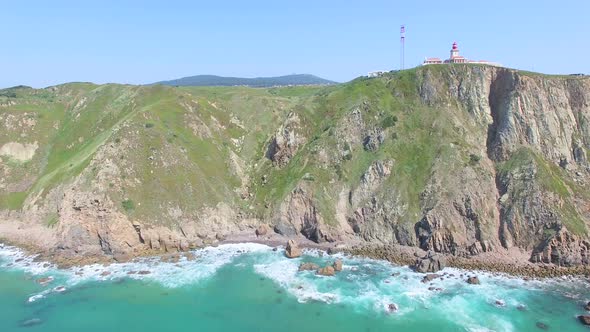 Sea view of lighthouse at Cabo da Roca cape, westernmost extent of mainland Portugal and continental alt