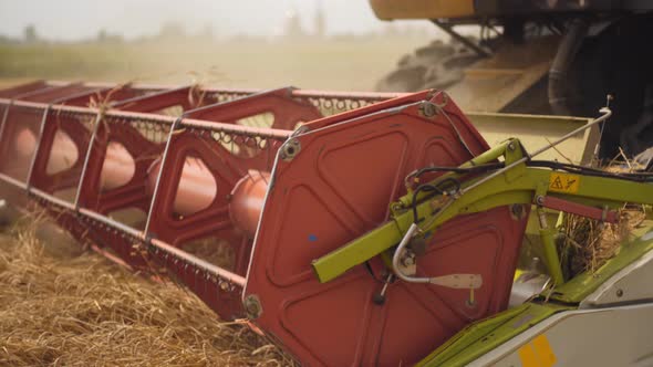 Rotary Straw Walker Combine Harvester Cuts and Threshes Ripe Wheat ...