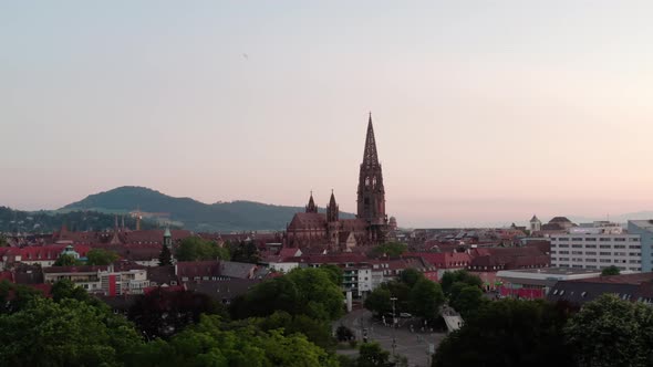 Freiburg im Breisgau City View Church Blackforest Germany 4k cinematic aerial shot alt