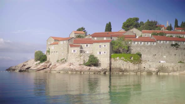 Sveti Stefan Is a Tourist Town By the Sea. Montenegro. Day alt
