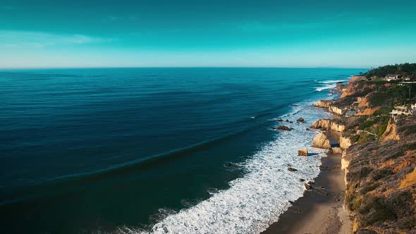 Deserted Wild El Matador Beach Malibu California Aerial Ocean View - Waves with Rocks