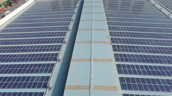 Solar power station on factory rooftop alt