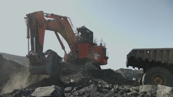 Work of Excavator with Russian Flag on Coal Deposit in Kemerovo