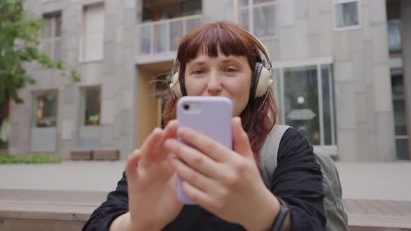 Girl Listening Music From Smart Phone Mp3 Player alt