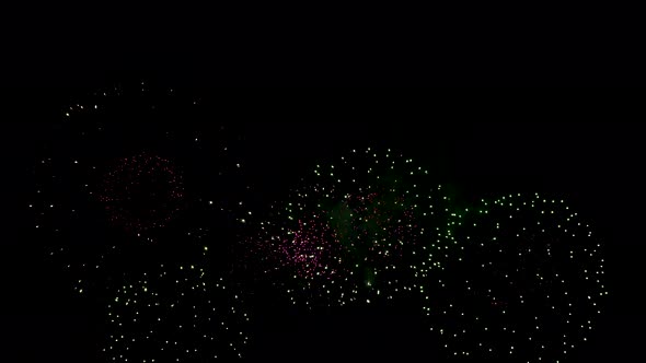 Many flashing colourful fireworks in event amazing with black background. alt