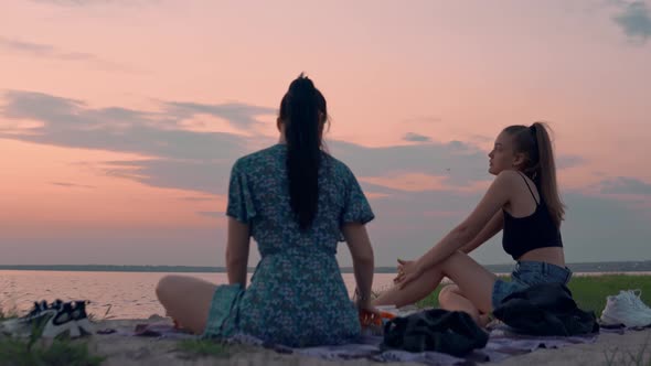 Friends Relaxing on Beach