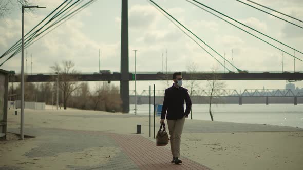 Businessman Walking In Face Mask On Coronavirus Lockdown.Coronavirus Lockdown Self Distance Pandemic alt