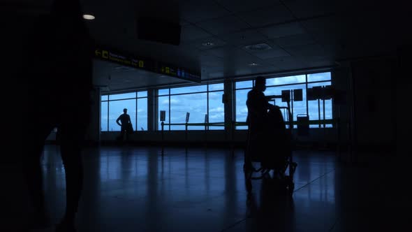 People Silhouettes at the Airport