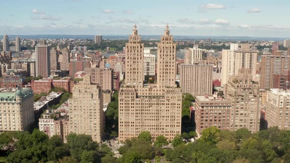 AERIAL Flight Along Beautiful New York City Street at Central Park on Sunny Summer Day alt