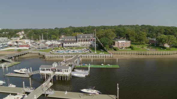 Aerial Pan of Boats Docked Near Pier at Manhasset Bay Long Island alt