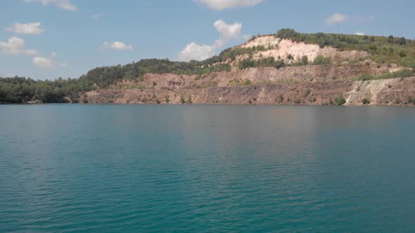 Turquoise Quarry Lake on a Summer Day alt