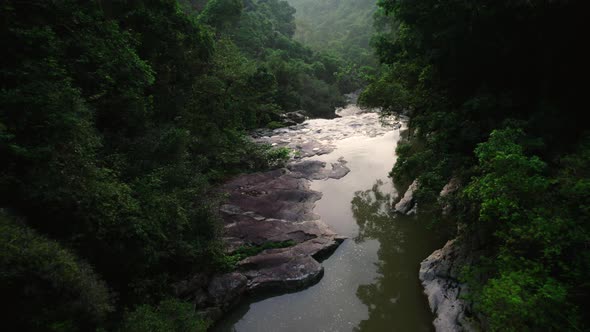 Drone view of calm river just before Hin Lat waterfall, Koh Samui, Thailand alt