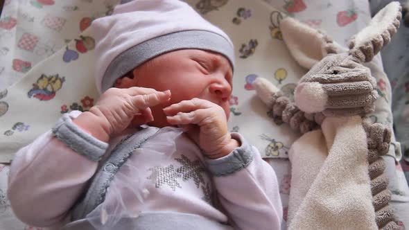 Unhappy Newborn Baby Infant Crying alt