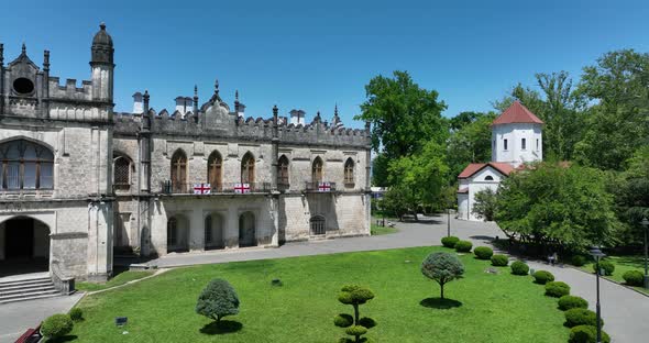 Zugdidi, Georgia - May 30 2022: Aerial view of Dadiani Palace in the center of Zugdidi city alt
