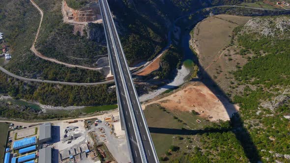 The Big Red Coat of Arms of Montenegro is Seen on One of the Bridge's Pillar alt