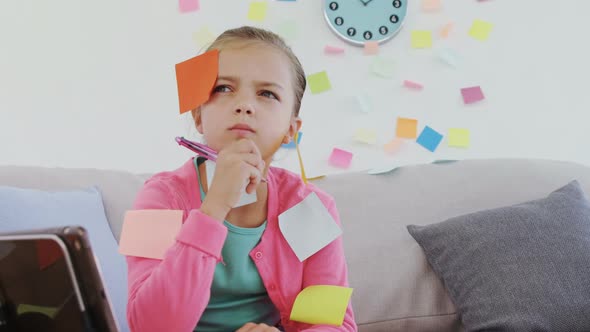 Thoughtful girl as executive writing on the sticky notes 4K 4k alt