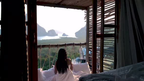 Phangnga Bay Asian Woman Waking Up in Bed in Nature Jungle Looking Out Over Ocean and Jungle During alt