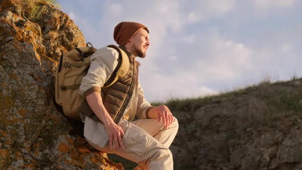 Man Taking Picture Of Landscape alt